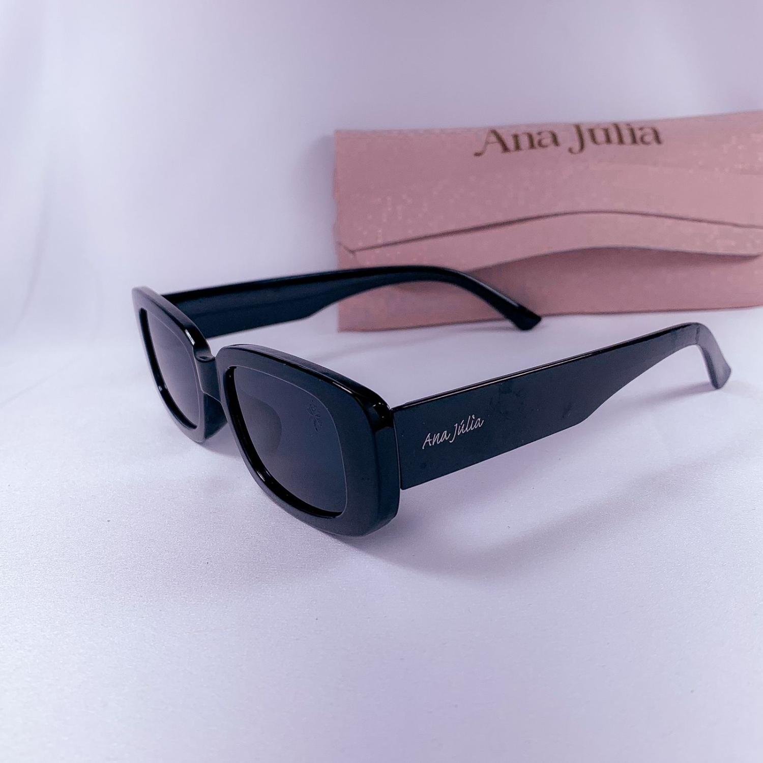 ÓCULOS SOLAR ANA CAROLINA, COM LENTES POLARIZADAS, UV400, ARMAÇÃO RETANGULAR MARROM