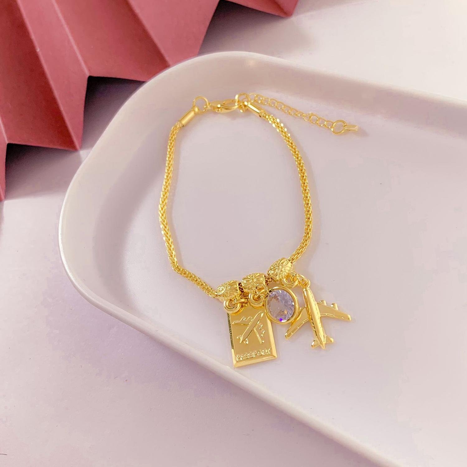 PULSEIRA VIAGEM COM PINGENTES PENDURADO OURO 18K